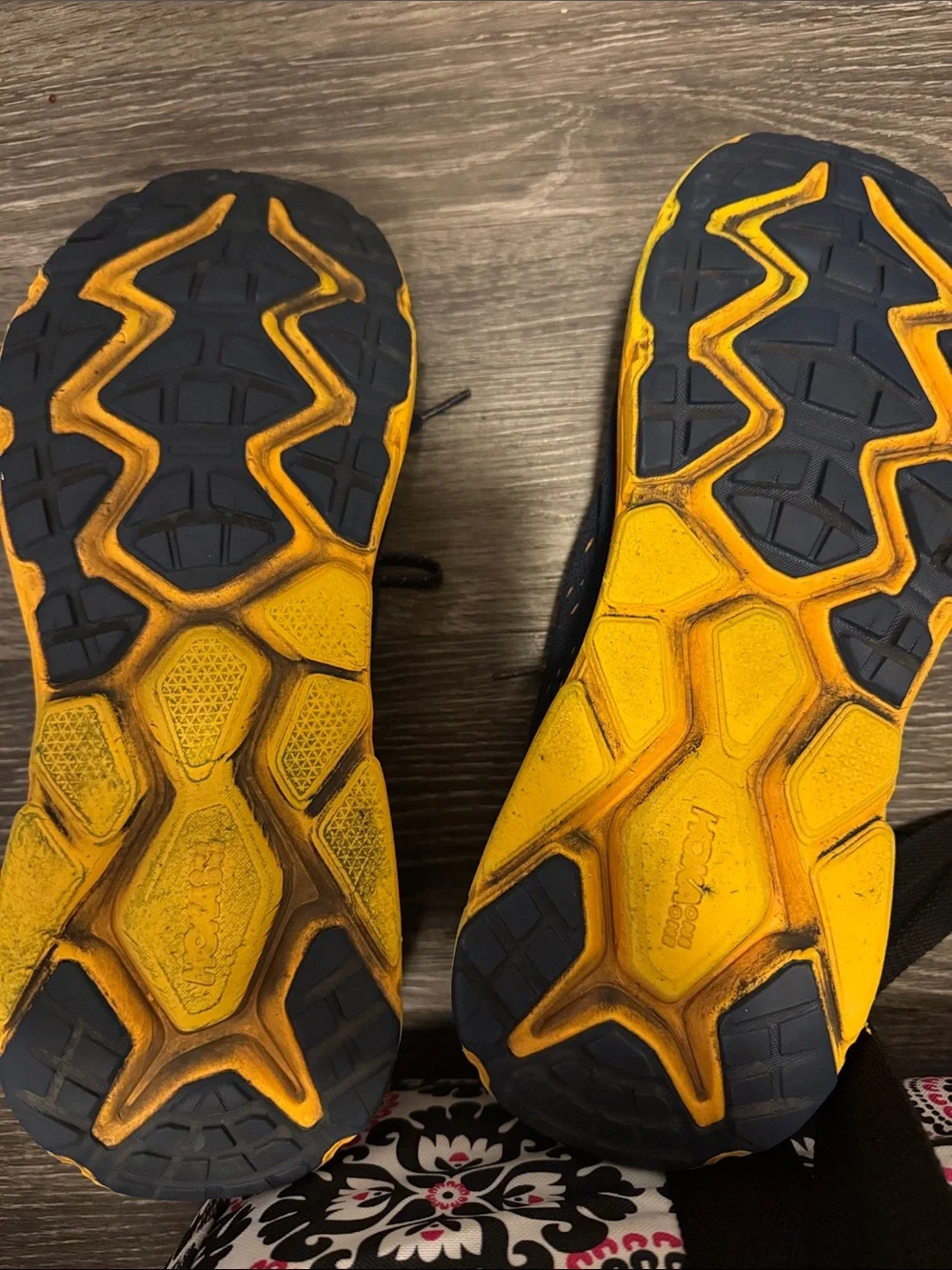 Hoka Men's Navy Athletic Shoes with Red and Yellow Accents
